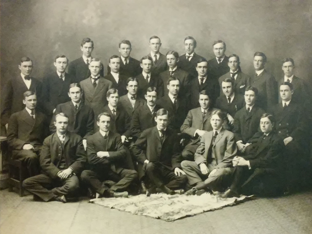Group Photo by Elmer Chickering found behind map